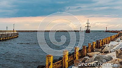 A cruise ship entering the port in DarÅ‚owo on the Baltic Sea, Stock Photo